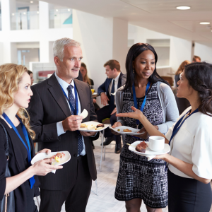 A group of professionals attending a networkign event to give information about their orginations